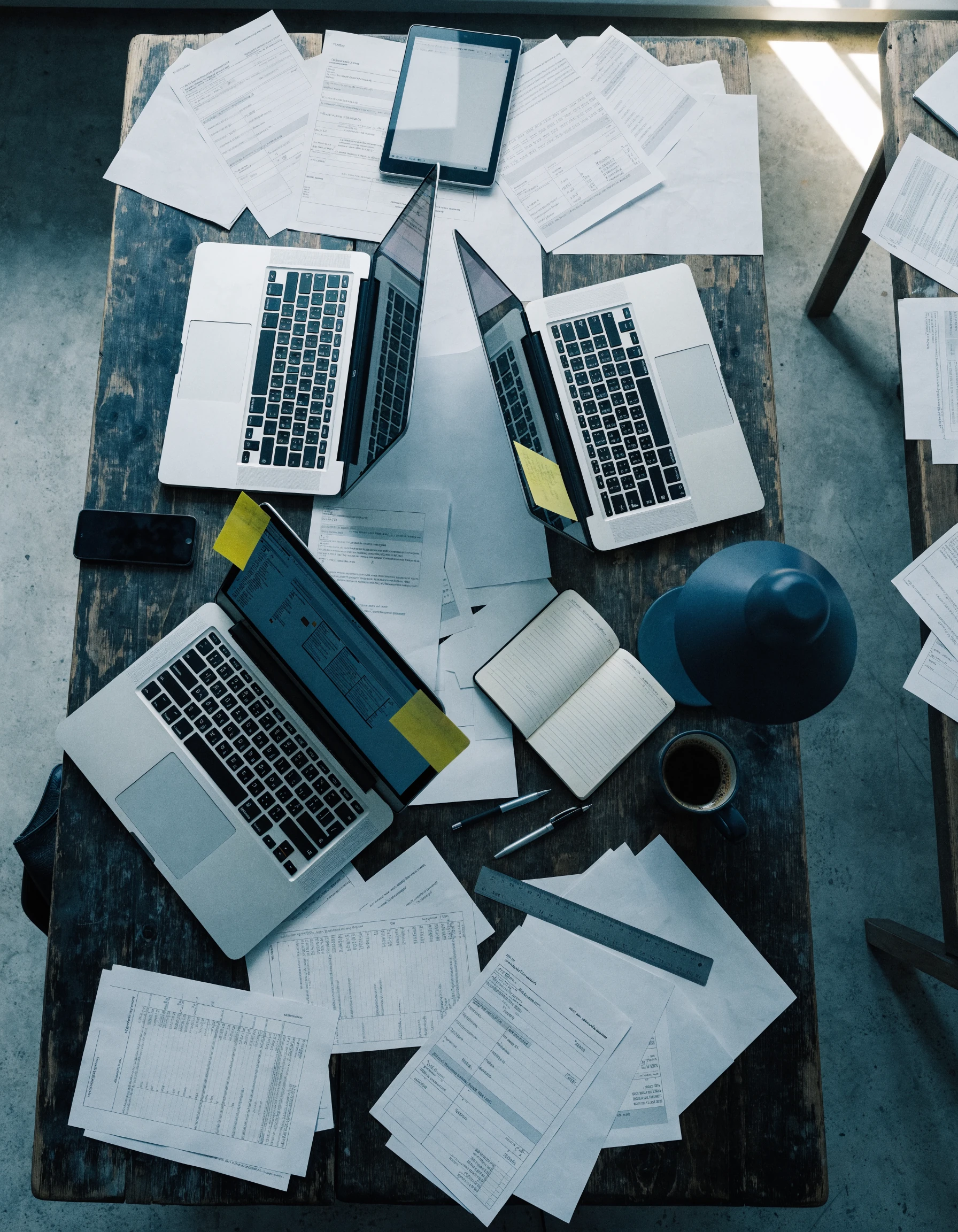 Late-night cluttered maritime procurement desk